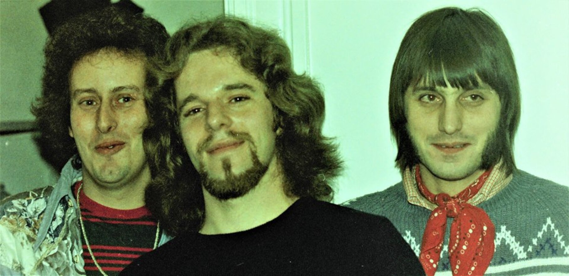 Bob Fries (Cinti filmmaker who moved to NY & became John Lennon's film partner & producer of film Ladies & Gentlemen The Rolling Stones), Doug Yeager, & Freddie Meyer at 1975 party in band's house Straight St Cinti